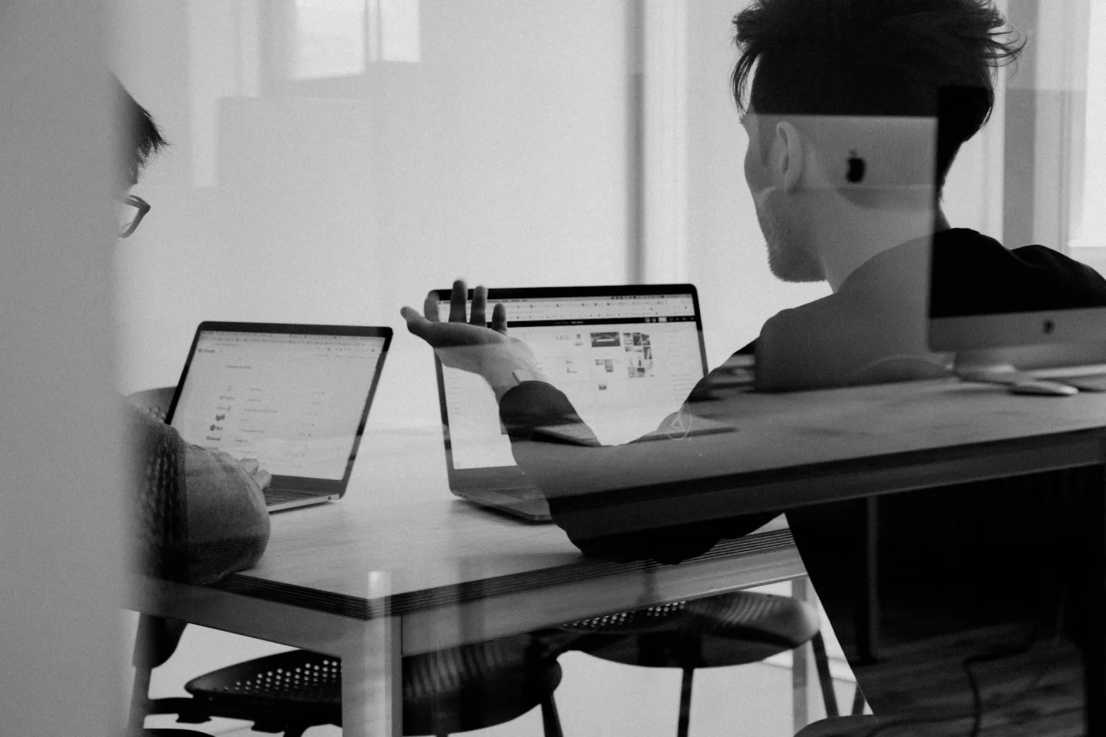 Workspace with laptop and planning whiteboard